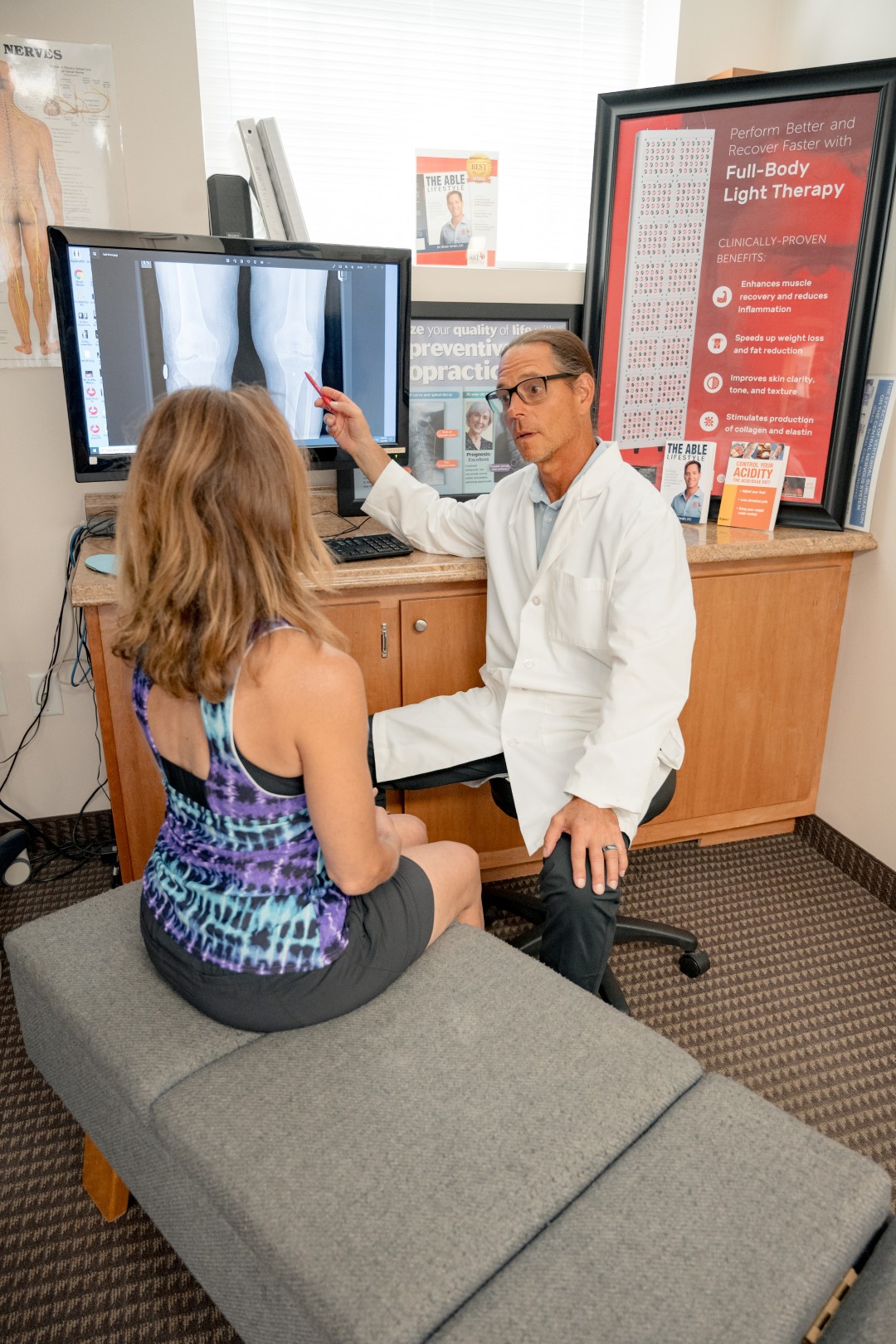 Dr Brian explaining chiropractic procedure